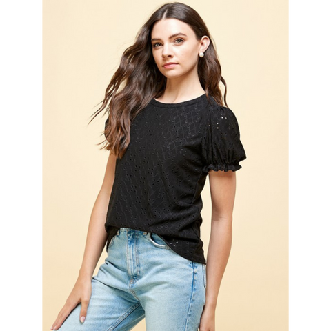 black shirt with eyelet fabric and short puffy sleeves