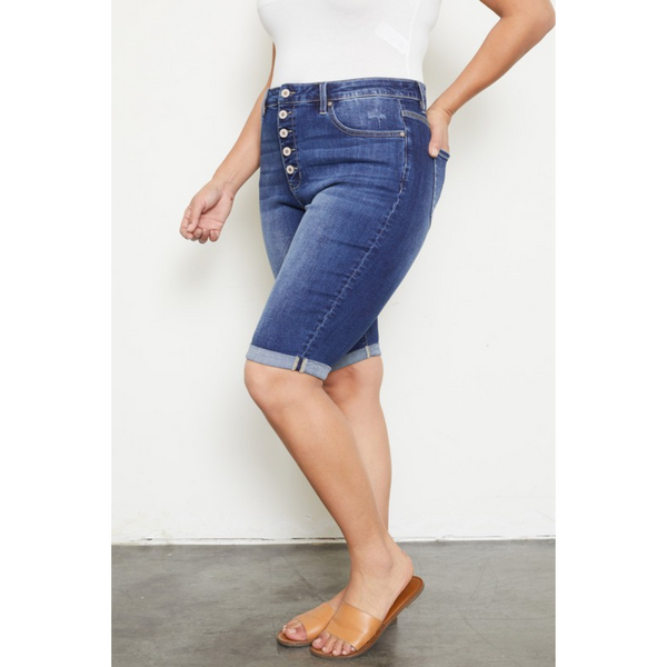 side view of denim bermuda shorts with button fly