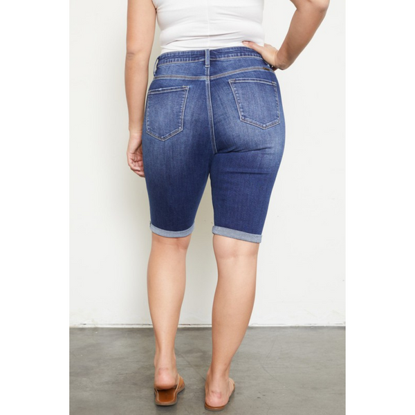 rear view of denim bermuda shorts with button fly