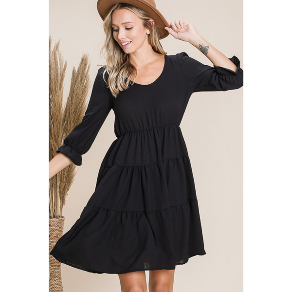 tiered black dress with 3/4 length sleeves