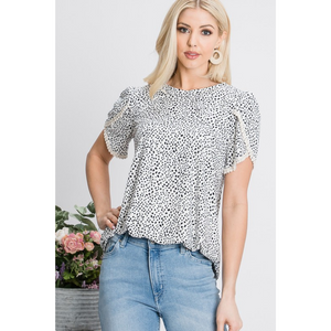 cream tulip sleeve top with black spotted pattern and lace trim