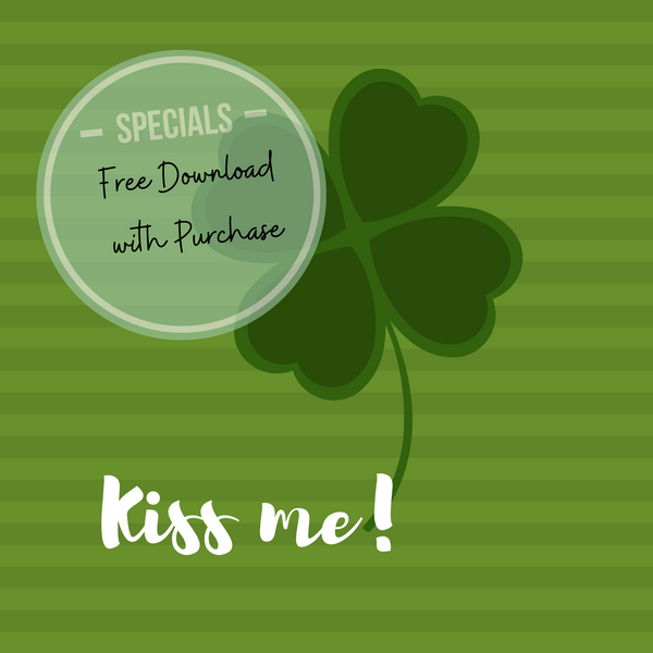 four leaf clover with the words "kiss me!" underneath. Green on green striped background.
